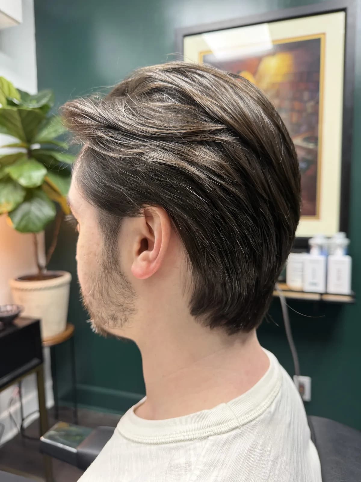 Finished cut — layered through the sides, worn back